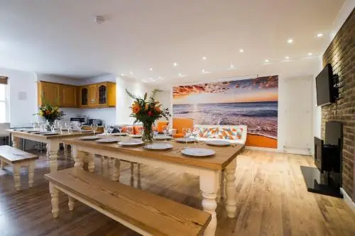 Offsite venue - Super stylish group house by the sea - sleeps 12! thumbnail